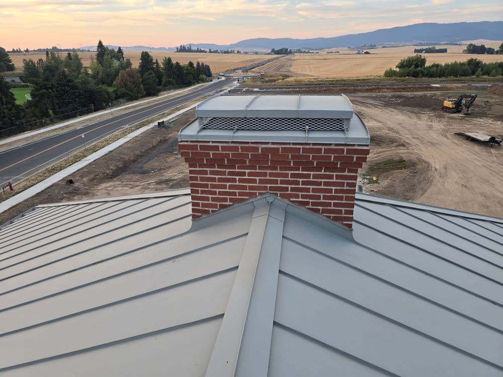 Chimney flashing with no exposed fasteners.