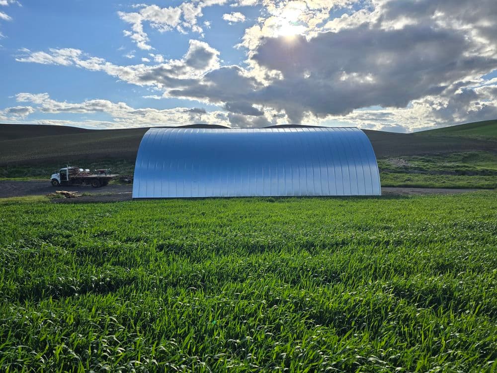 Curved Panel Metal Roof on a Quonset Hut in Potlatch image
