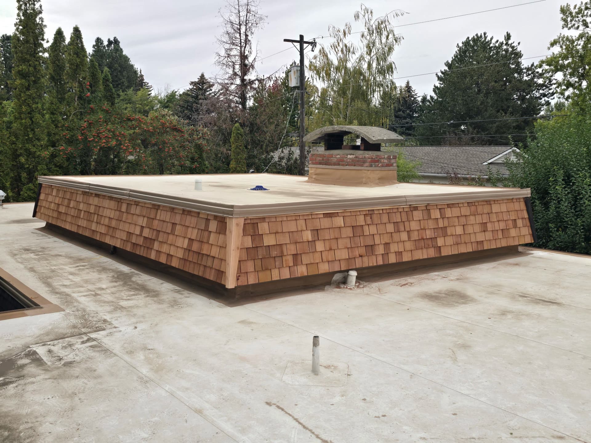 Gallery photos for Fresh Cedar Shingles on a Flat Roof Parapet Wall: Image #1