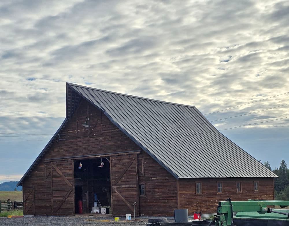 Historic 1900s Barn Gets a New Metal Roof in Deary Idaho image